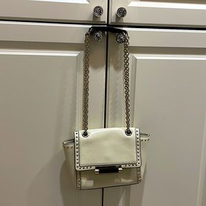 DVF purse. Cream with gold studs. Black handle and gold chain